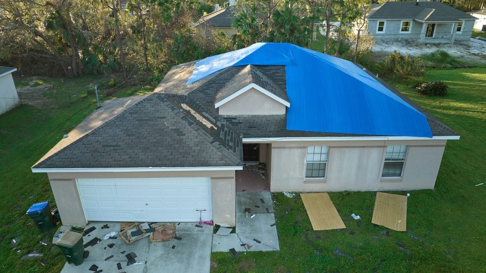Shrink Wrap vs Blue Tarps: Emergency Roof Repair Guide
